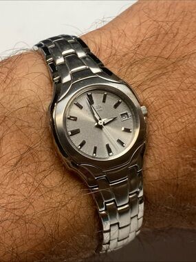 Citizen E011-S049601, Silver dial, Stainless eco drive Watch, with box
